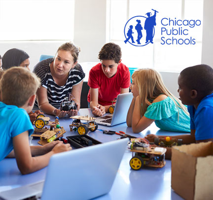 Students working on robotics with teacher with Chicago Public Schools logo